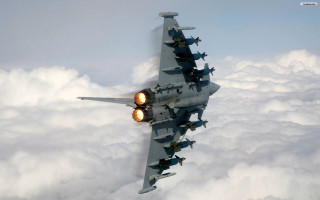 Fighter jet flying above clouds 4 - colin hayes free wallpaper