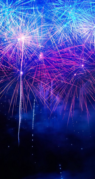 Fireworks sky blue clouds pink - free new year wallpaper