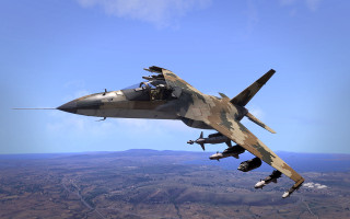 Military jet flying below mountain - a military free wallpaper