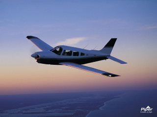 Small plane sunset ocean city - a small plane free wallpaper