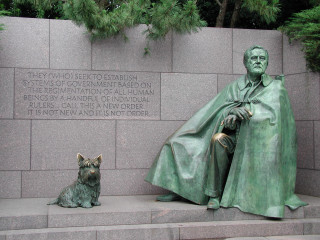Statue man dog sitting wall - a statue of a man free wallpaper
