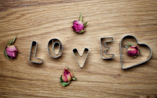 Cookie cutter love flowers wooden - a wooden surface free wallpaper
