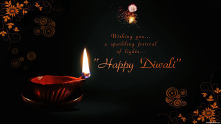 Lit candle happy diwali dark 2 - flower and swirls free wallpaper