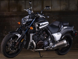 Motorcycle parked garage brick wall - a brick wall behind free wallpaper