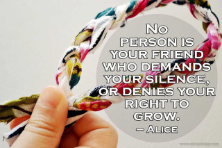 Person holding fabric quote no - a cross stitch free wallpaper
