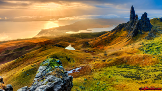 Mountain range rock formation lake - a sun free wallpaper