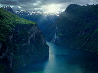 River mountains cloudy sky boat - the water below free wallpaper