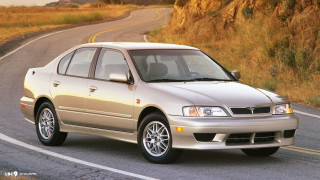 Silver car driving road grassy - a silver car free wallpaper
