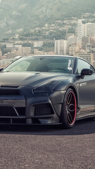 Gray sports car city mountain - matte finish free wallpaper