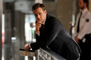 Man suit leaning railing promotional - a man in a suit free wallpaper