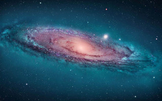 Spiral galaxy bright blue pink - blue center free wallpaper