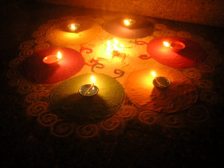 Lit candle circle table top - a circle free wallpaper