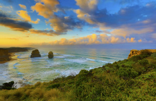 Sunset ocean cliffs cloudy sky - a cloudy sky free wallpaper