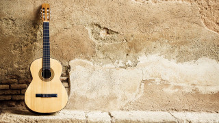 Guitar stone wall brick background 2 - a brick wall behind free wallpaper