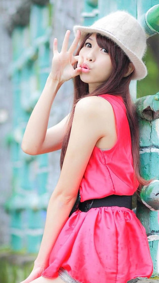 Alice pink dress hat outdoors - against free wallpaper