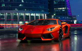 Red sports car night tokyo - a tall building free wallpaper