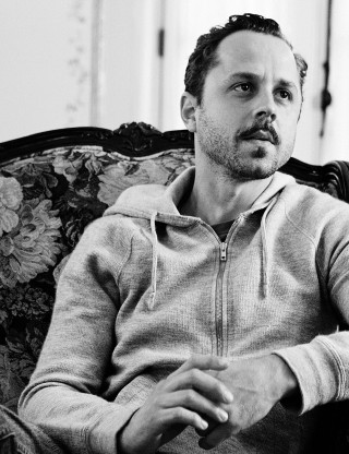 Man couch hoodie cigarette relaxed - free portrait wallpaper