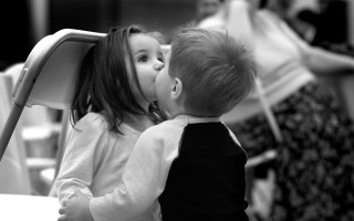 Boy girl kissing black white - free happy birthday wallpaper