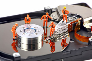 Hard drive small people middle - a hard drive free wallpaper