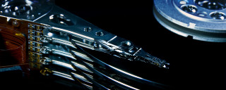 Metal closeup silver black background - a close up of a metal object free wallpaper