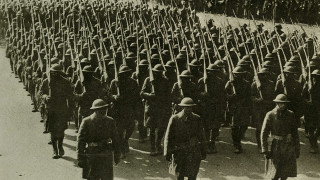 Marching men uniforms flags street - their head free wallpaper