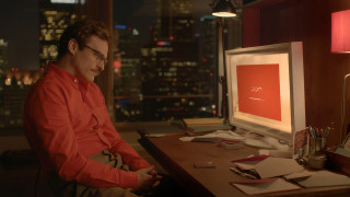 Man desk computer papers cityscape - a cityscape in the background free wallpaper