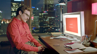 Man sitting desk computer monitor - a city view free wallpaper