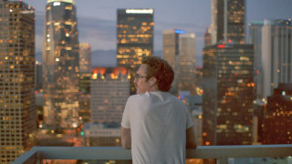 Man balcony city night skyscrapers 2 - a balcony free wallpaper