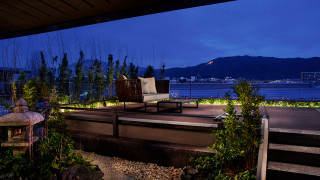 Patio chair table night water - a chair and a table free wallpaper