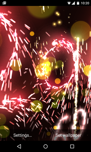 Fireworks red background yellow lights - free new year wallpaper