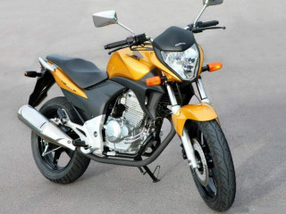 Yellow motorcycle parking lot building - cobra free wallpaper