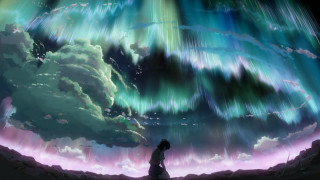 Man standing large aurora borealis - huge free wallpaper