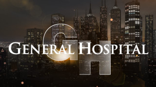 City skyline general hospital glowing - light in the middle free wallpaper