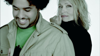 Smiling man woman looking phone - a white background free wallpaper