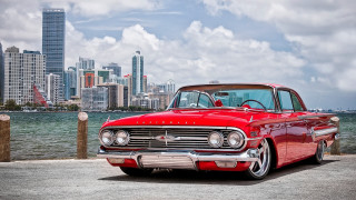 Red car waterfront cityscape cloudy - cloudy free wallpaper
