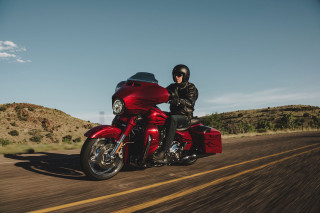 Man riding red motorcycle green - dan scott free wallpaper