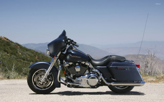 Motorcycle parked road mountain range - dan scott free wallpaper