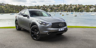 Silver infiniti parked road body - the side of a road near a body of water free wallpaper