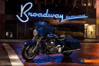 Blue motorcycle parked restaurant sign - a blue motorcycle free wallpaper