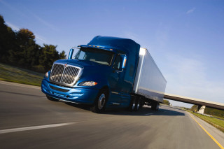 Blue semi truck highway sign - a highway next free wallpaper