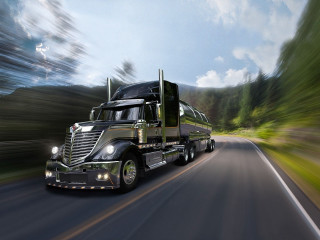 Semi truck driving road trees - a semi truck free wallpaper