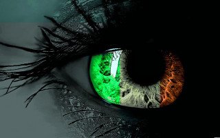 Close up green orange eye - a close up of a persons eye free wallpaper