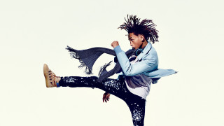 Woman dreadlocks jumping air leg - dreadlock free wallpaper