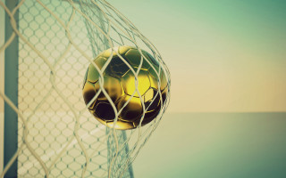 Soccer ball stuck in net 2 - alain tasso free wallpaper
