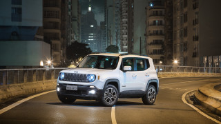 White jeep night street buildings - panfuturism free wallpaper