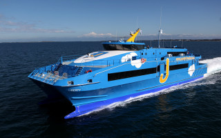 Blue white boat traveling water - charles mozley free wallpaper