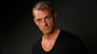 Man black shirt serious look 8 - adam willaerts free wallpaper