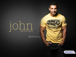 Man yellow shirt posing hands - his hip free wallpaper