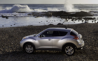 Silver car rocky beach ocean - a silver car free wallpaper
