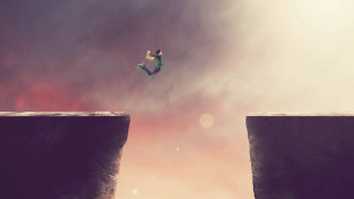 Person jumping cliff kite sky - a cliff free wallpaper for desktop